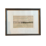 Framed artwork of a pier on a white background