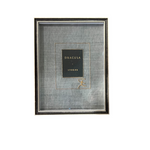 Framed book cover with 'Dracula' by Bram Stoker on a white background