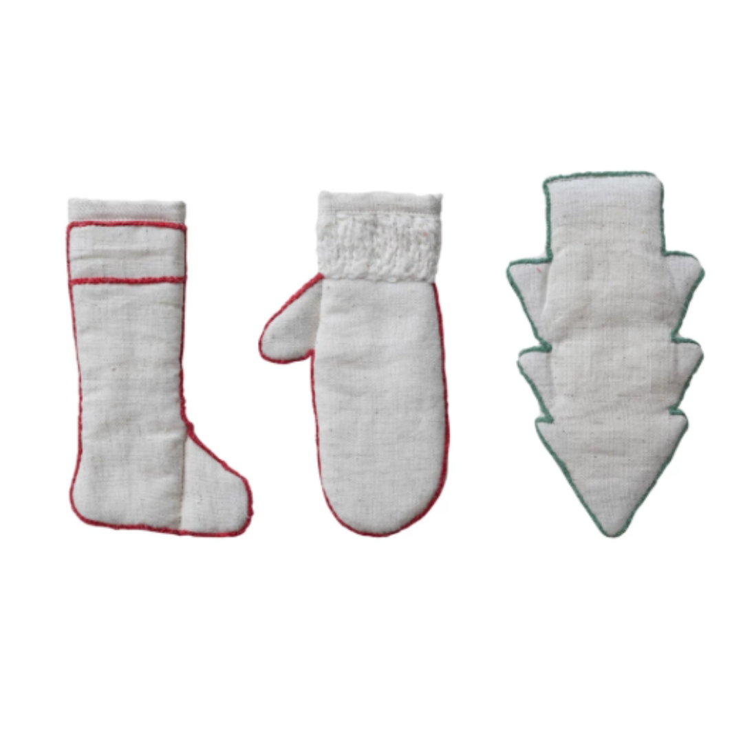 Set of white gloves with red trim on a white background