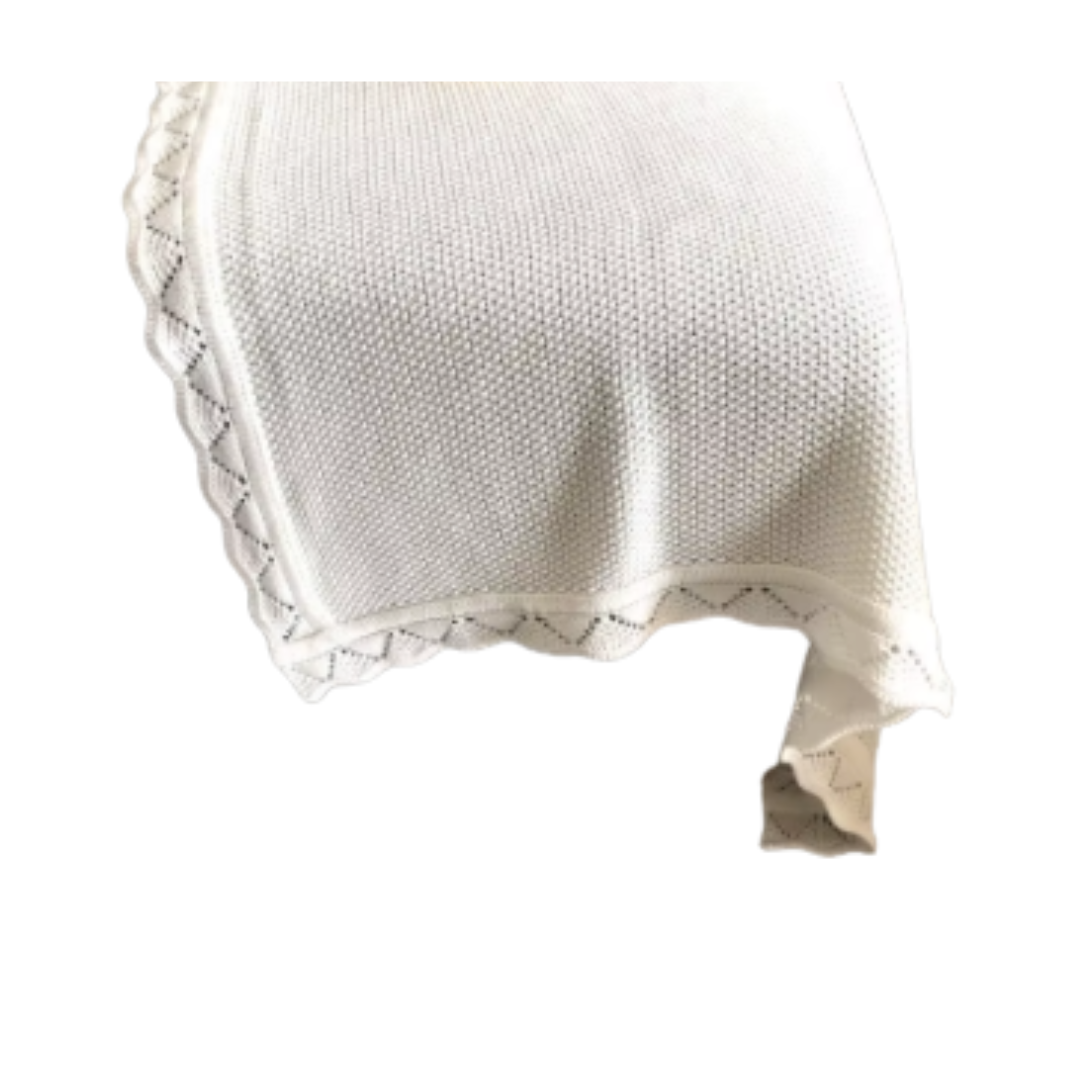 Soft ivory cotton knit baby blanket with textured pattern and scalloped edge