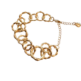 Gold chain bracelet on a white background