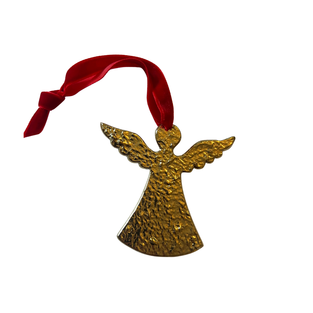 Gold angel ornament with red ribbon on a white background