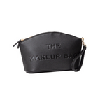 Black makeup bag with 'THE MAKEUP BAG' text on a white background