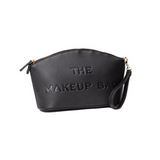 Black makeup bag with 'THE MAKEUP BAG' text on a white background