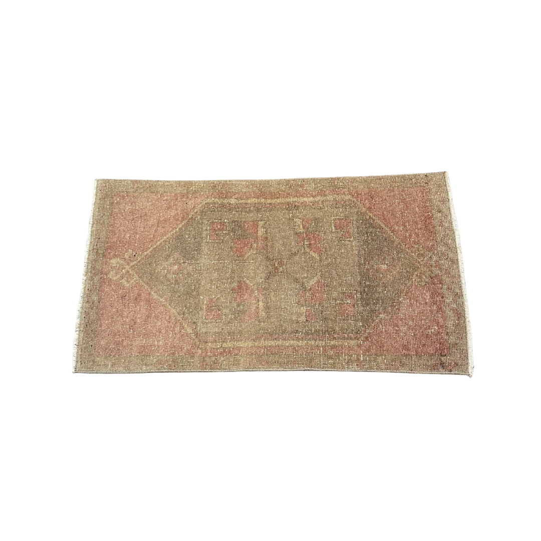 Rectangular doormat with geometric pattern on a white background