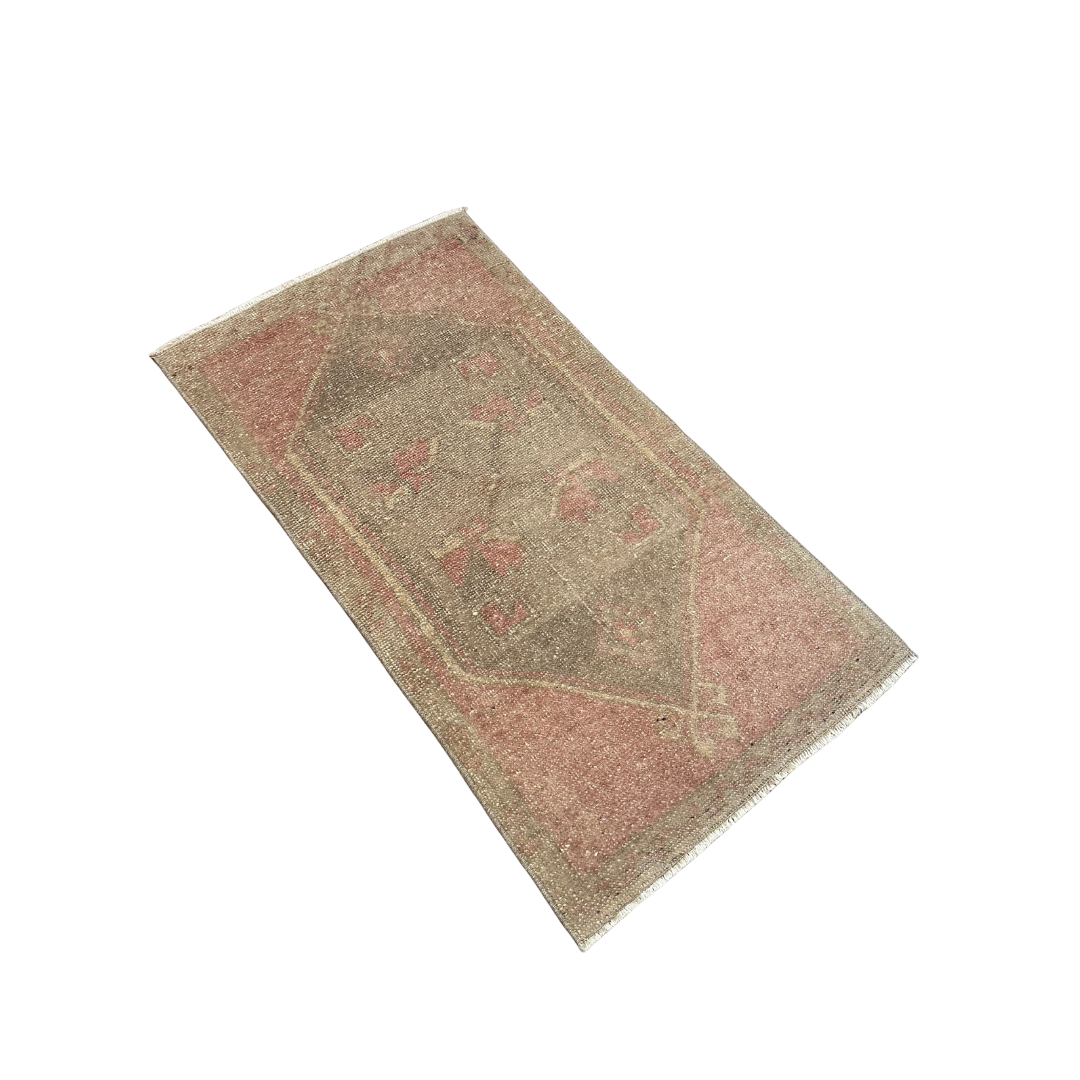 Rectangular rug with a geometric pattern on a white background