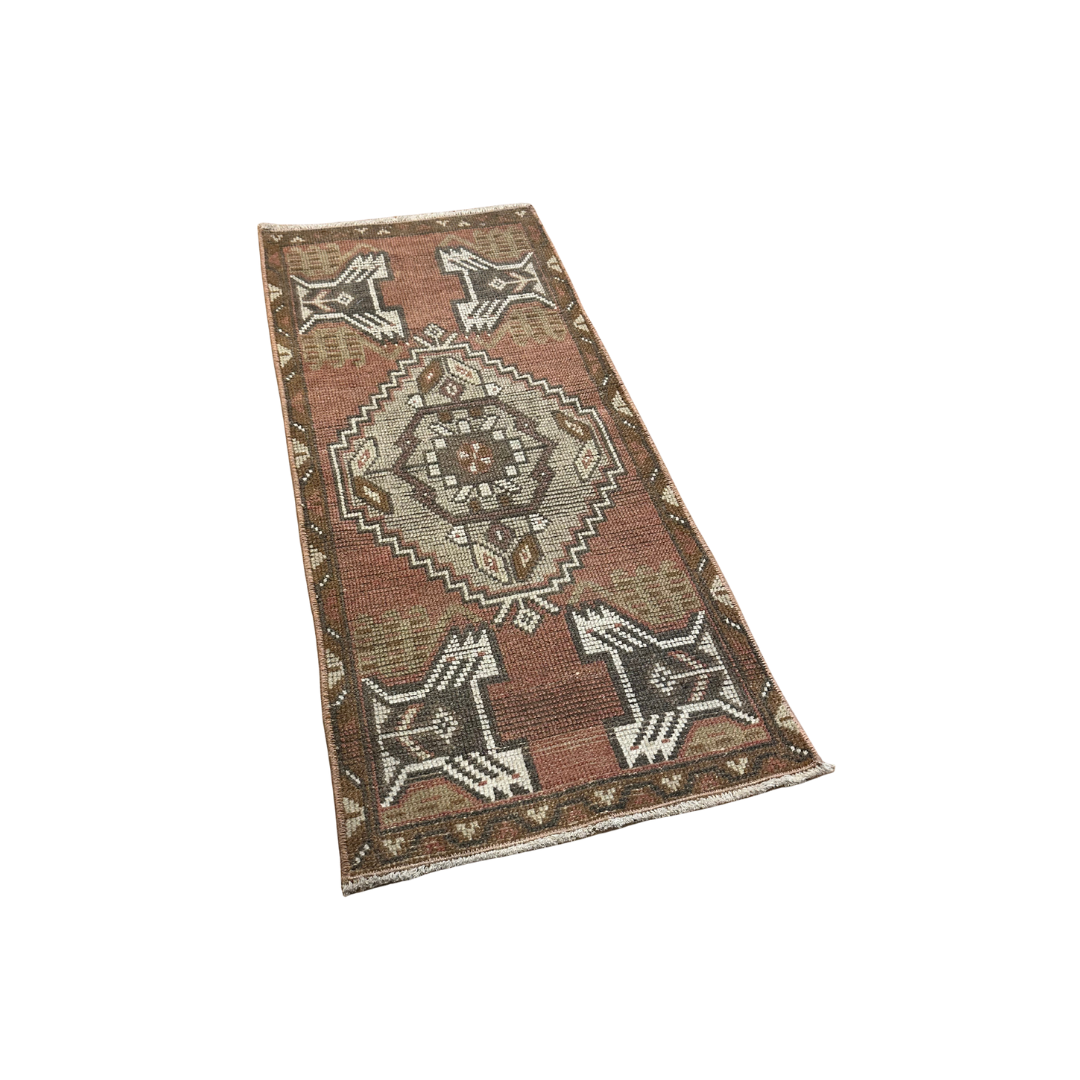 Decorative rug with geometric pattern on a white background