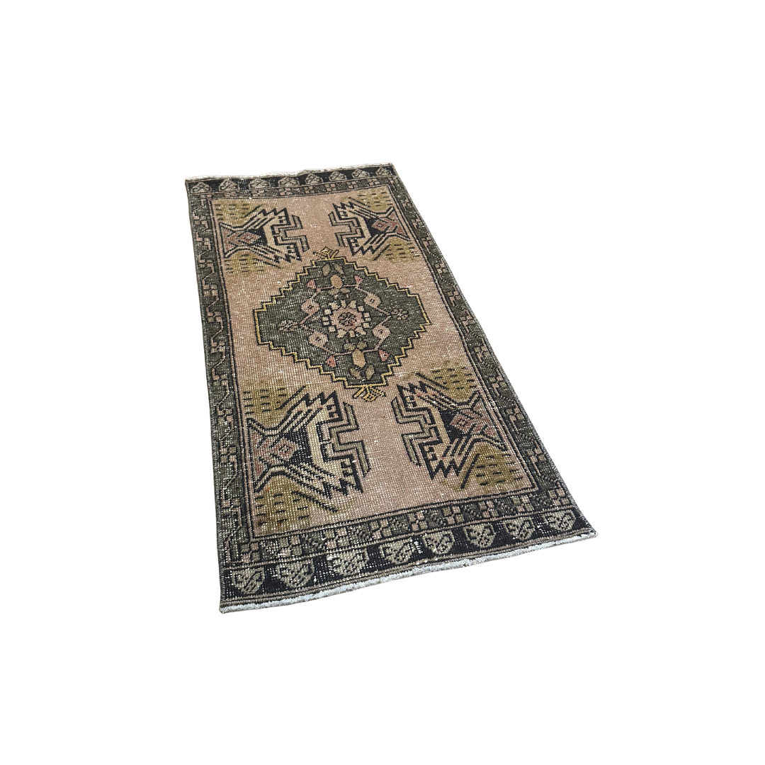 Decorative rug with geometric pattern on a white background