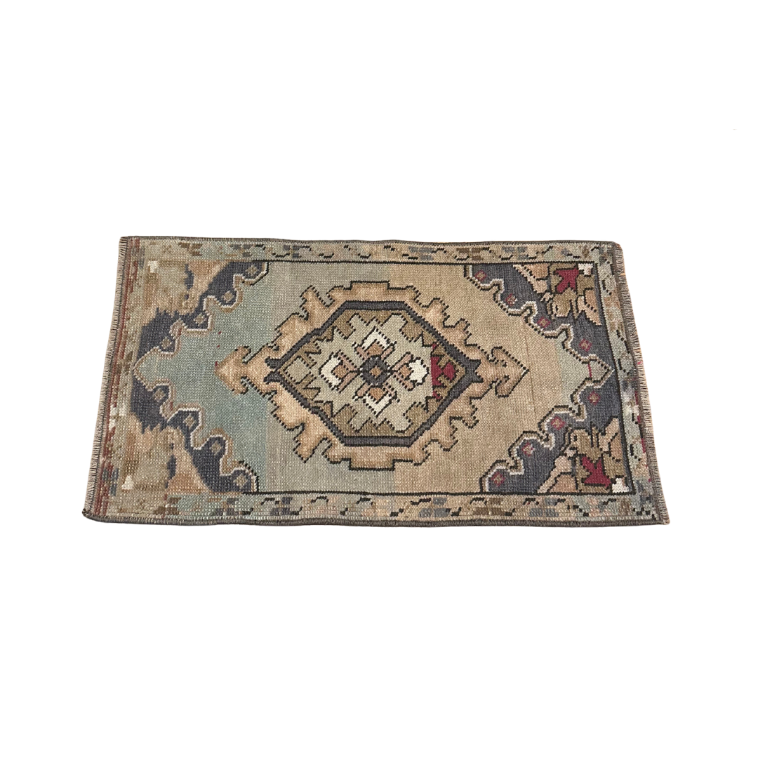 Decorative rug with geometric pattern on a white background