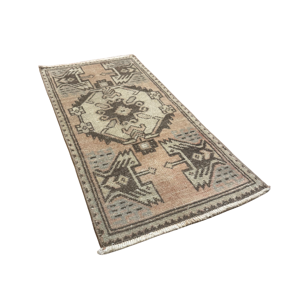 Decorative rug with geometric pattern on a white background