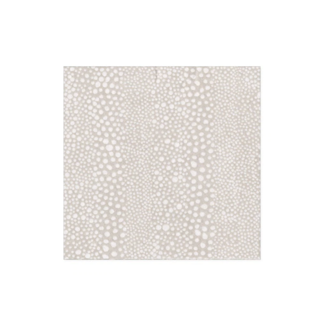 White paper with a subtle pattern of small gray dots on a white background