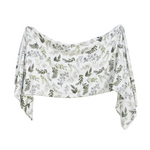 White fabric with green leaf pattern on a white background