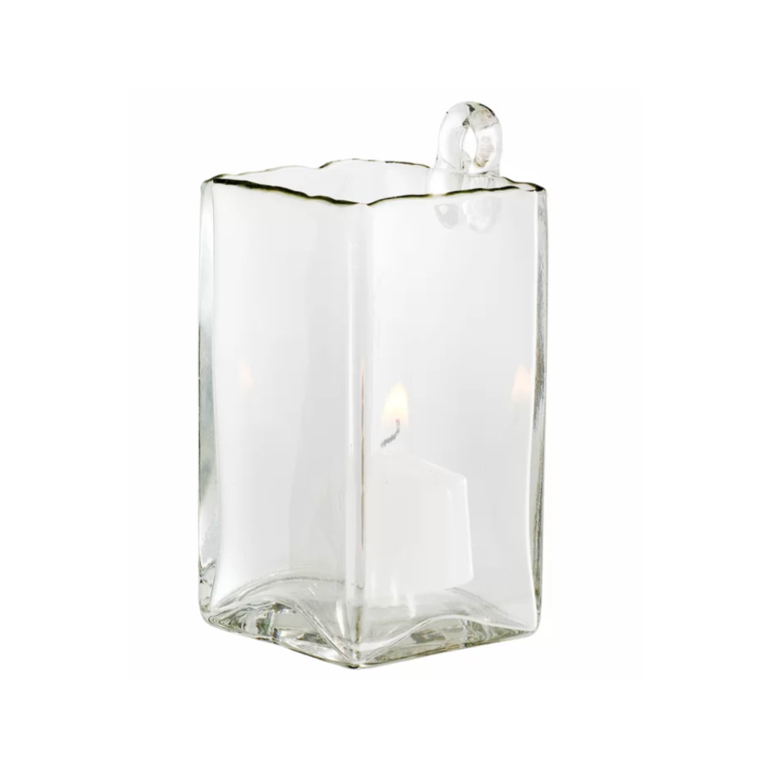 Clear glass hanging vase on a white background