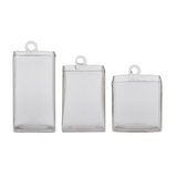 Three clear rectangular hanging containers with loops on a white background