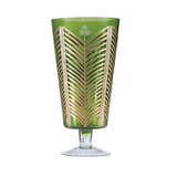 Green glass with gold leaf pattern on a white background