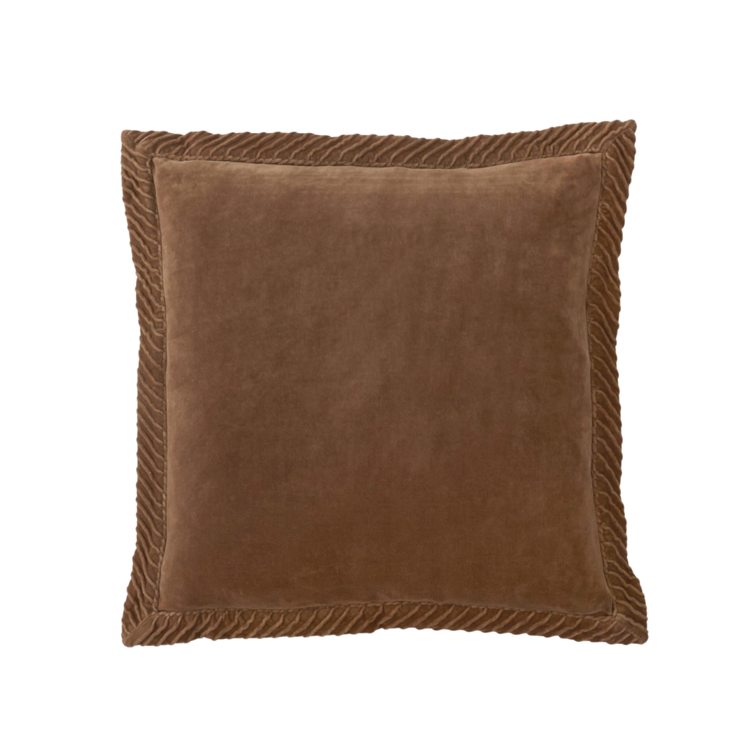 Brown pillow with decorative edge on a white background