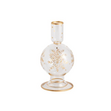 Decorative vase with gold snowflake design on a white background