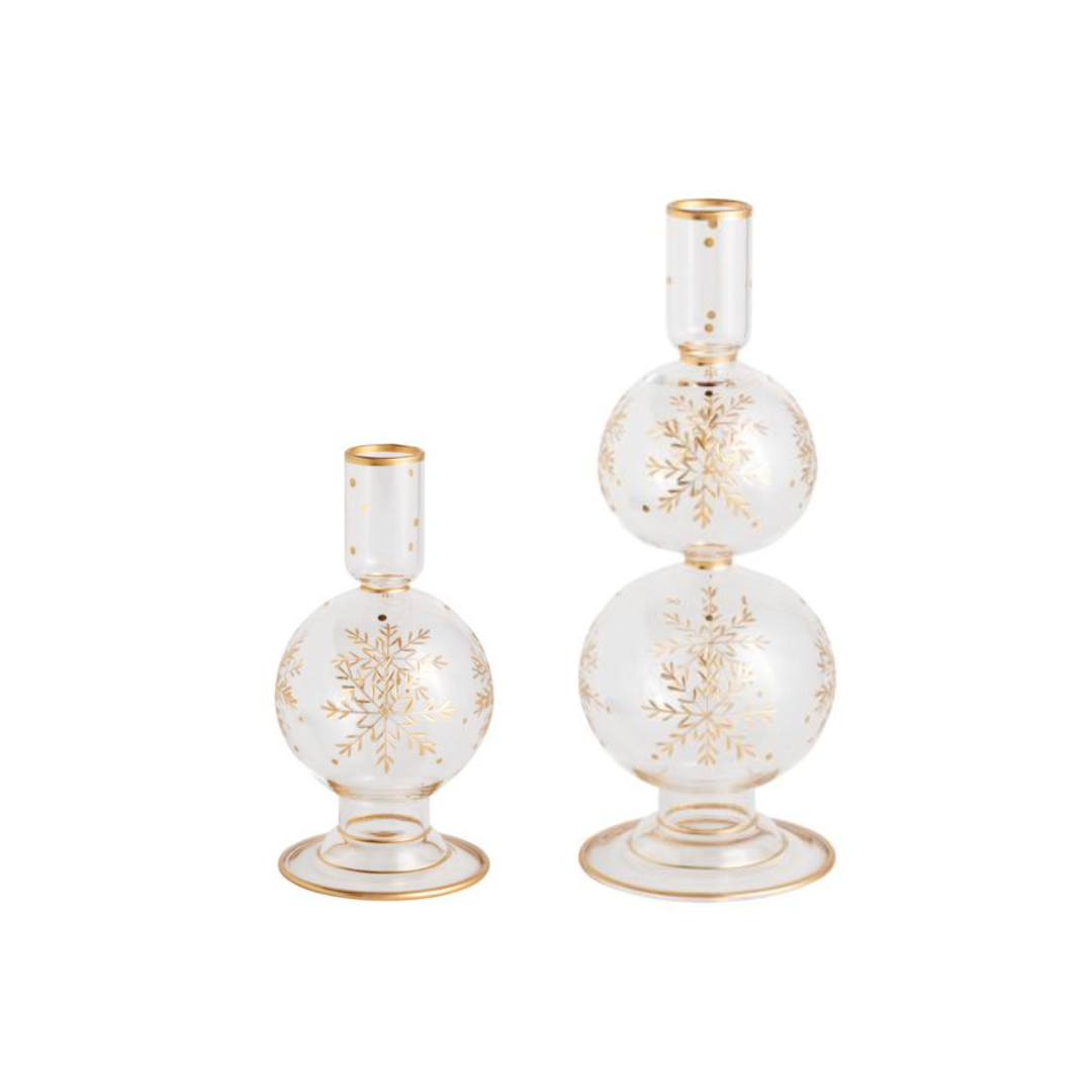 Set of three decorative vases with gold floral patterns on a white background