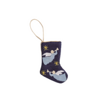 Knitted stocking ornament with angel design on a white background