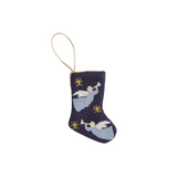 Knitted stocking ornament with angel design on a white background