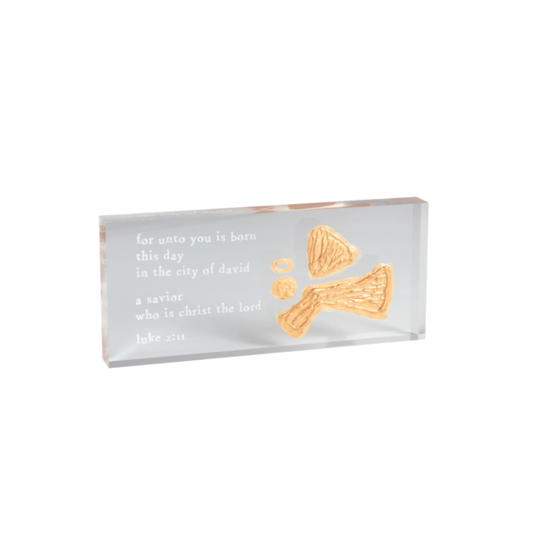 Decorative plaque with text and gold angel design on a white background