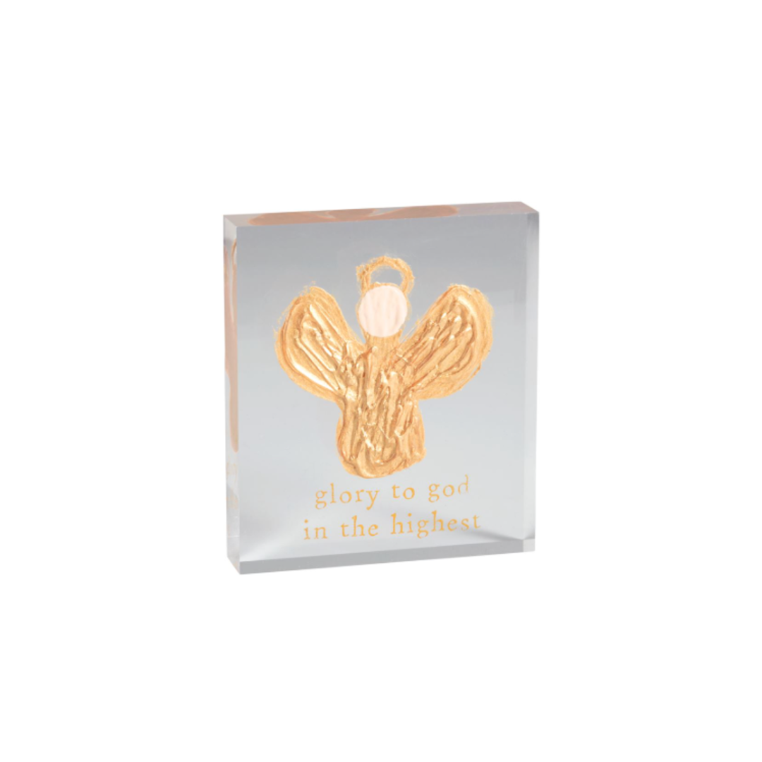 Decorative angel figure with 'glory to God in the highest' text on a white background