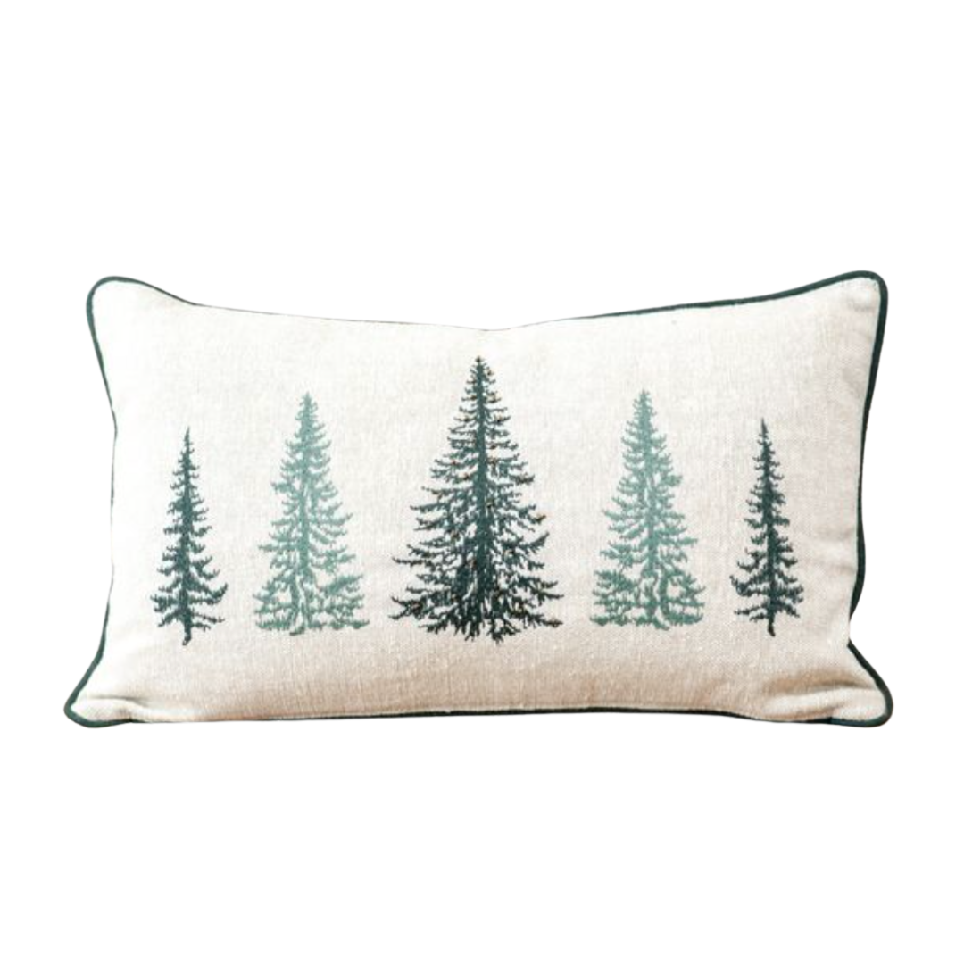 Decorative pillow with tree patterns on a white background