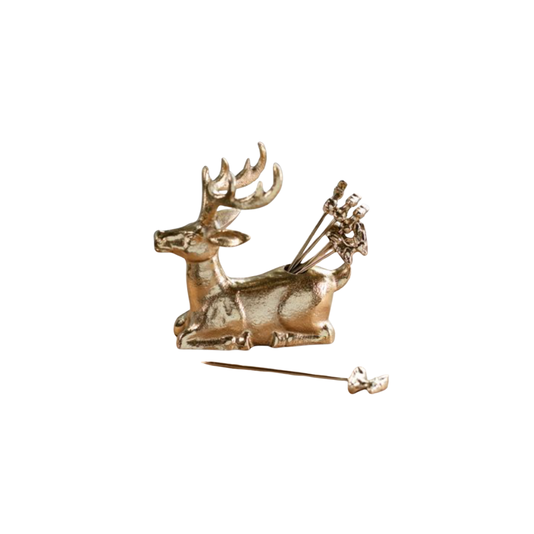 Gold deer-shaped appetizer picks and holder on a white background