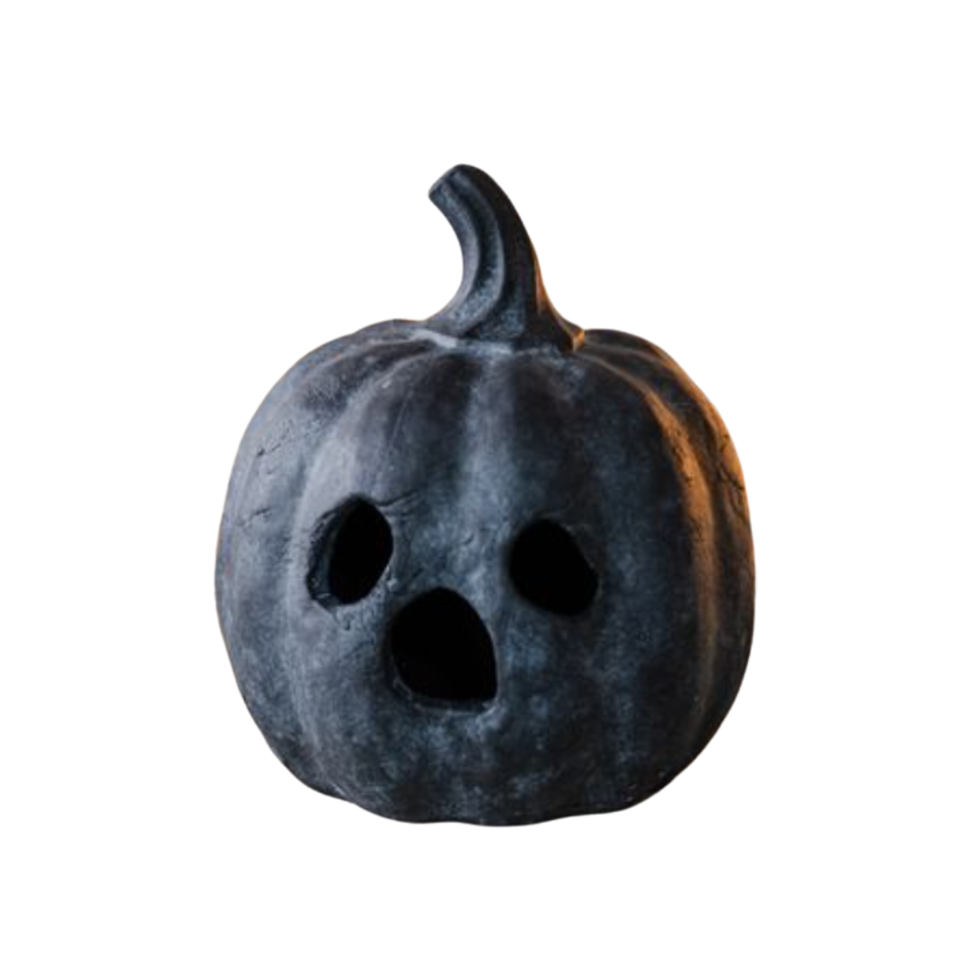 Black pumpkin with ghost face on a white background