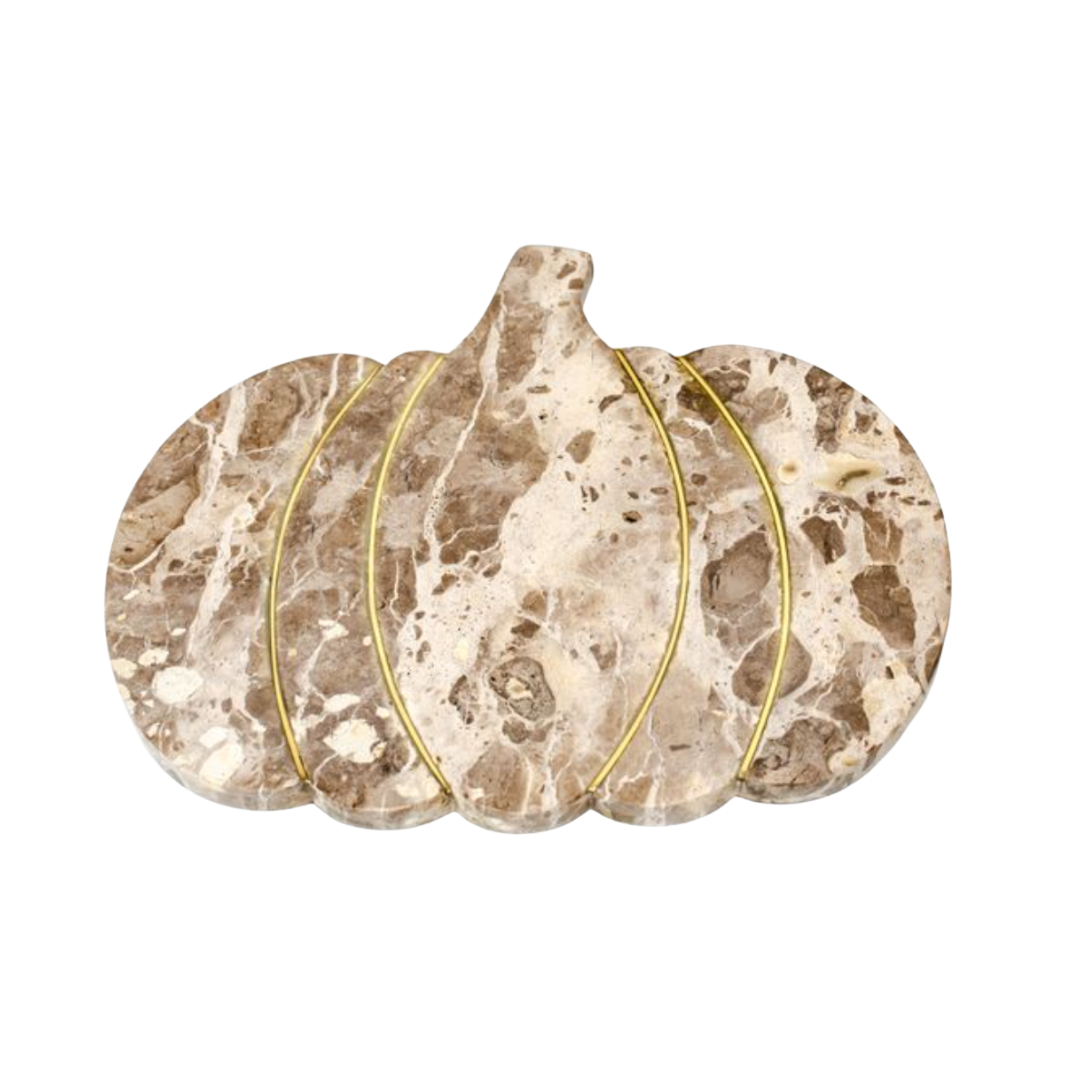 marble pumpkin serving board on white background