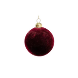 Red Christmas ball ornament with gold hook on a white background