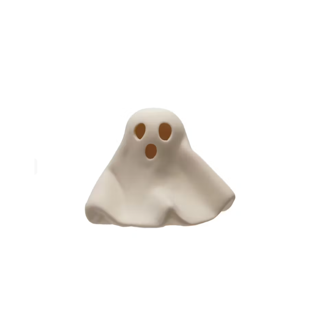 Ceramic ghost figurine on a white background