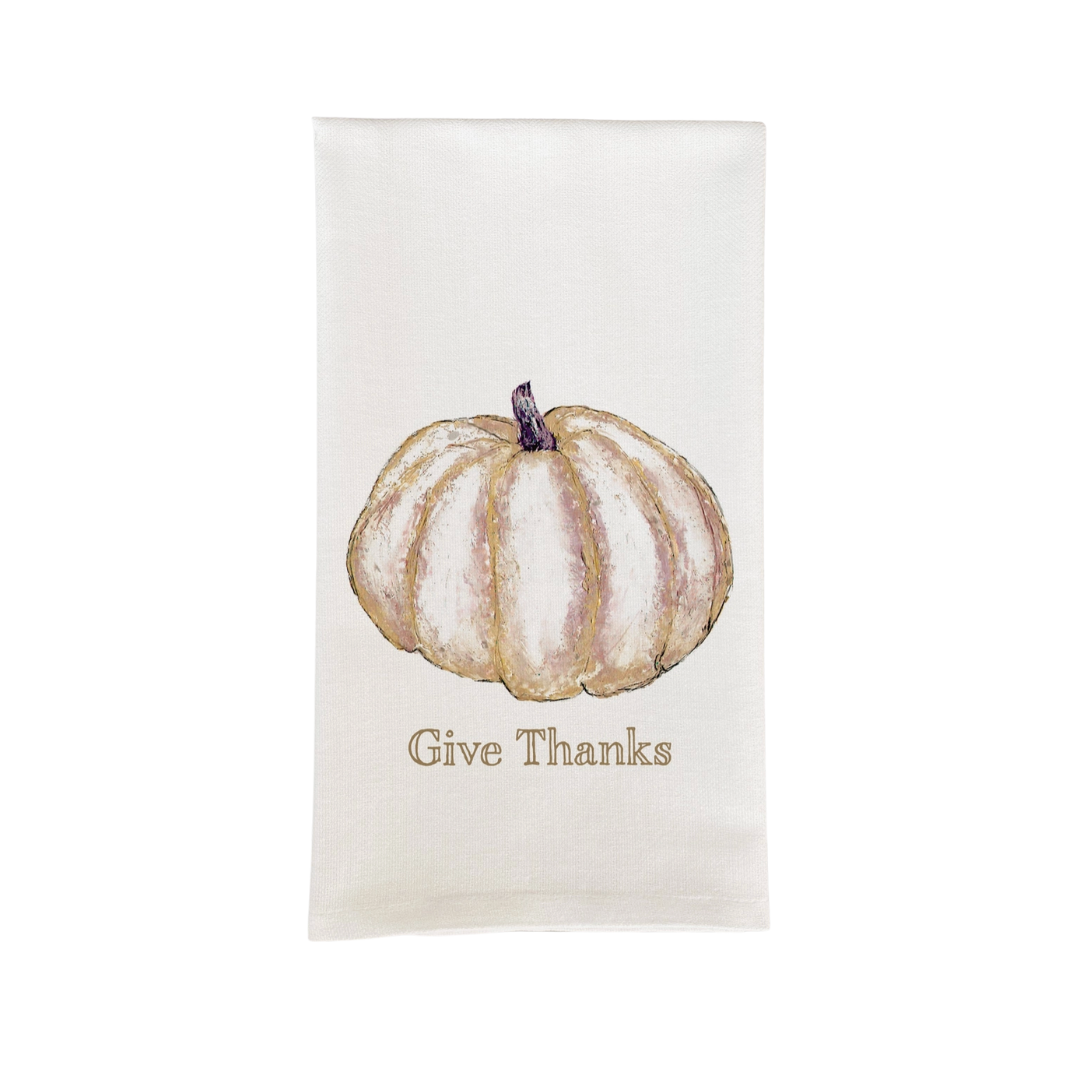 Tea towel with a pumpkin design and 'Give Thanks' text on a white background