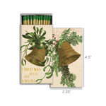 Matchbox with Christmas design featuring bells and greenery, with dimensions displayed.