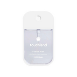Touchland hand sanitizer bottle on a white background