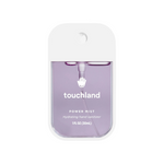Touchland power mist hand sanitizer packaging on a white background