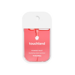Touchland power mist hand sanitizer bottle on a white background