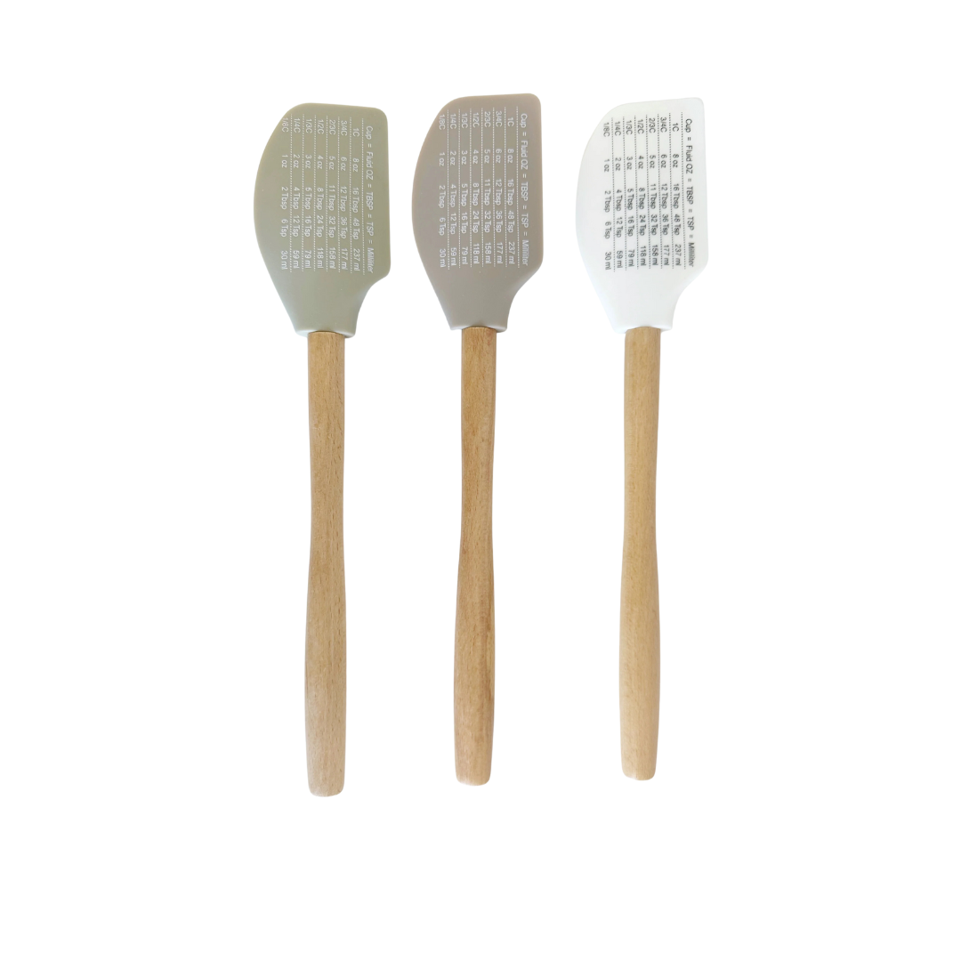 three colored silicone spatula with kitchen measurements 