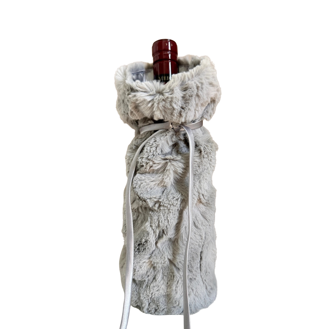 Fur wine bottle cover on a white background