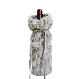 Fur wine bottle cover on a white background