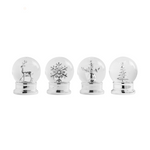 Four glass snow globes with silver bases on a white background