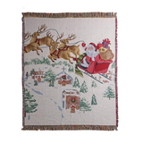 Woven blanket with Santa Claus and reindeer design on a white background