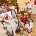 Woven blanket with Santa Claus and reindeer design in a Christmas setting
