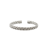 silver braided bracelet on white background