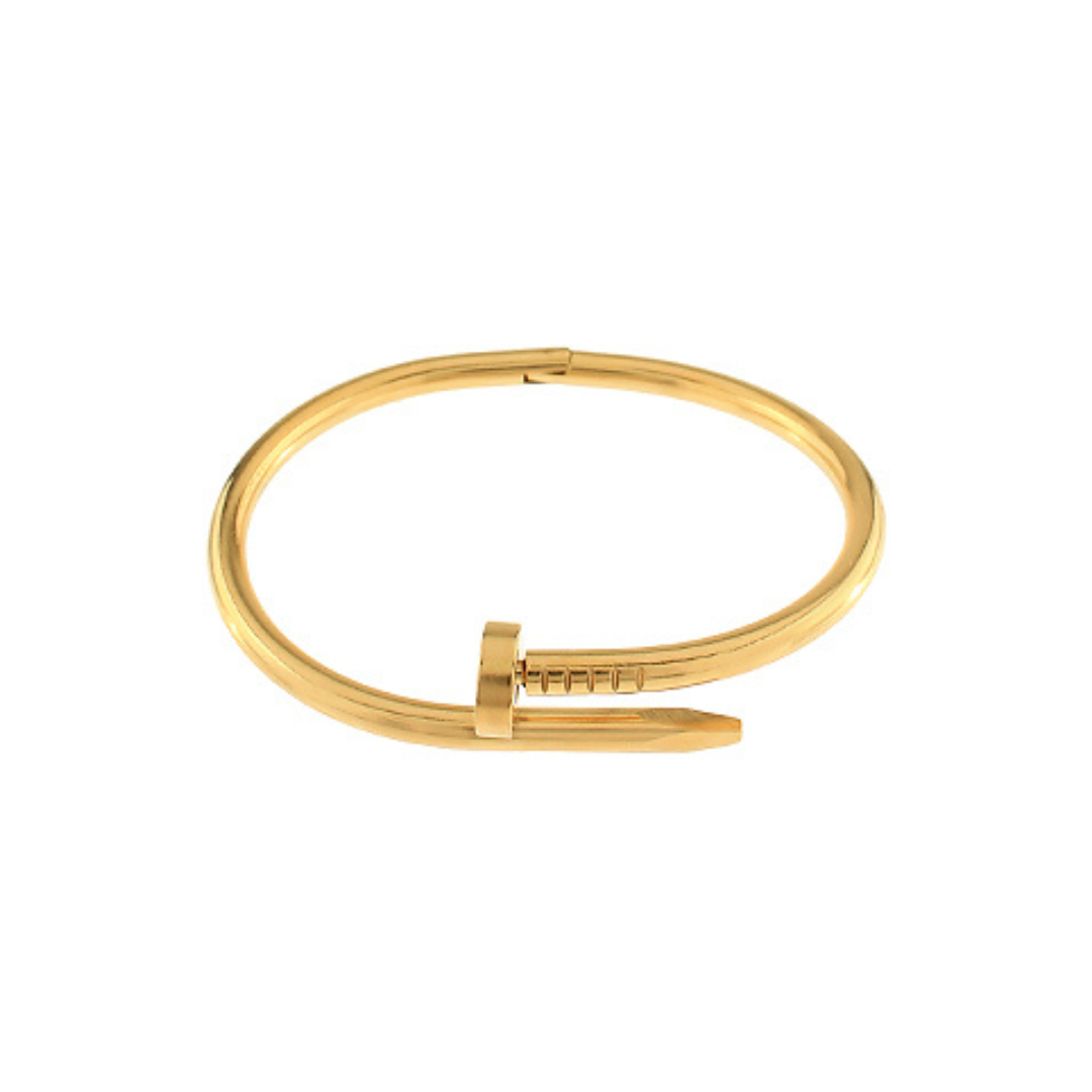 Gold bangle on a white background