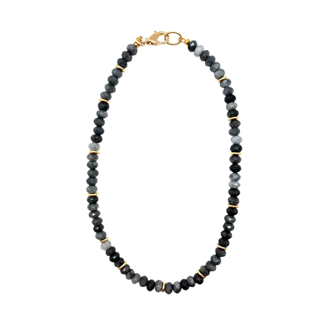 Necklace with black and gray beads on a white background