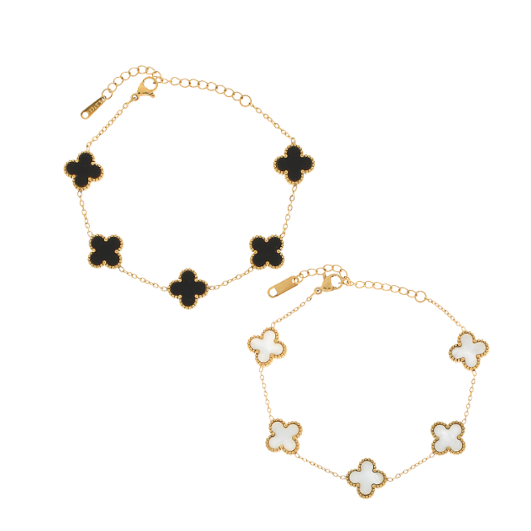 gold chain bracelet with five clover-shaped enamel charms, available in white or black enamel 