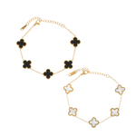 gold chain bracelet with five clover-shaped enamel charms, available in white or black enamel 