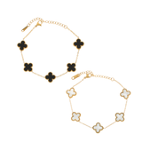 gold chain bracelet with five clover-shaped enamel charms, available in white or black enamel 