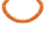 Orange beaded necklace with gold spacer accents on a white background